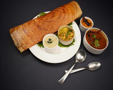 How Does Sixty5 Street Brampton Make Its Dosas and Wraps So Crispy and Flavorful?